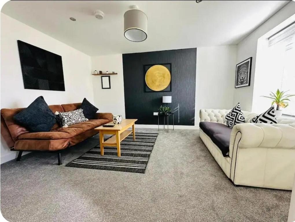 a living room with a couch and a table at Maize Walk Retreat - Ashford Beauty in Ashford