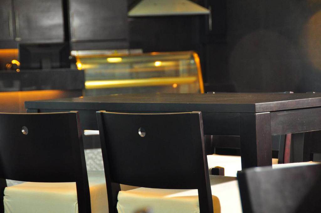 Kuchyň nebo kuchyňský kout v ubytování Tat Place Hotel