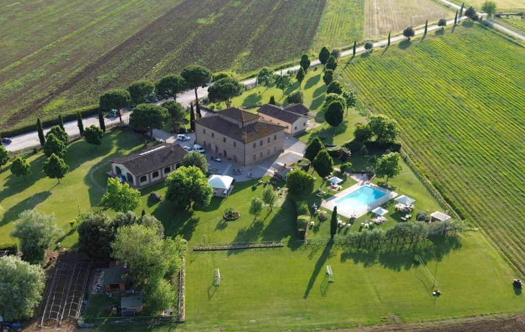 an aerial view of a house in a field at Agriturismo La Colmata in Cesa