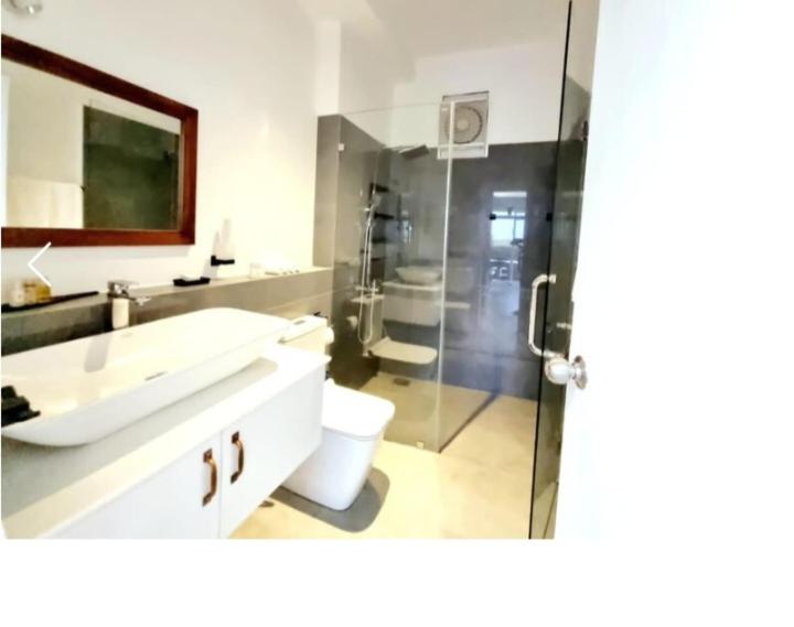 Koupelna v ubytování Studio apartment ocean breeze negombo by NB