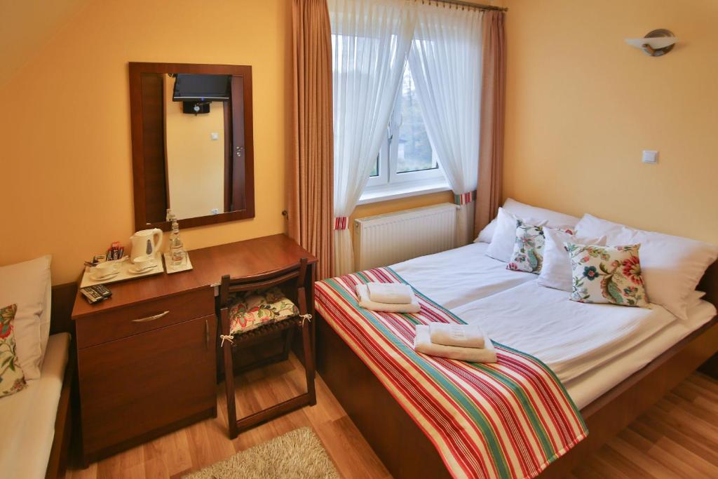 Posteľ alebo postele v izbe v ubytovaní Villa Kasper