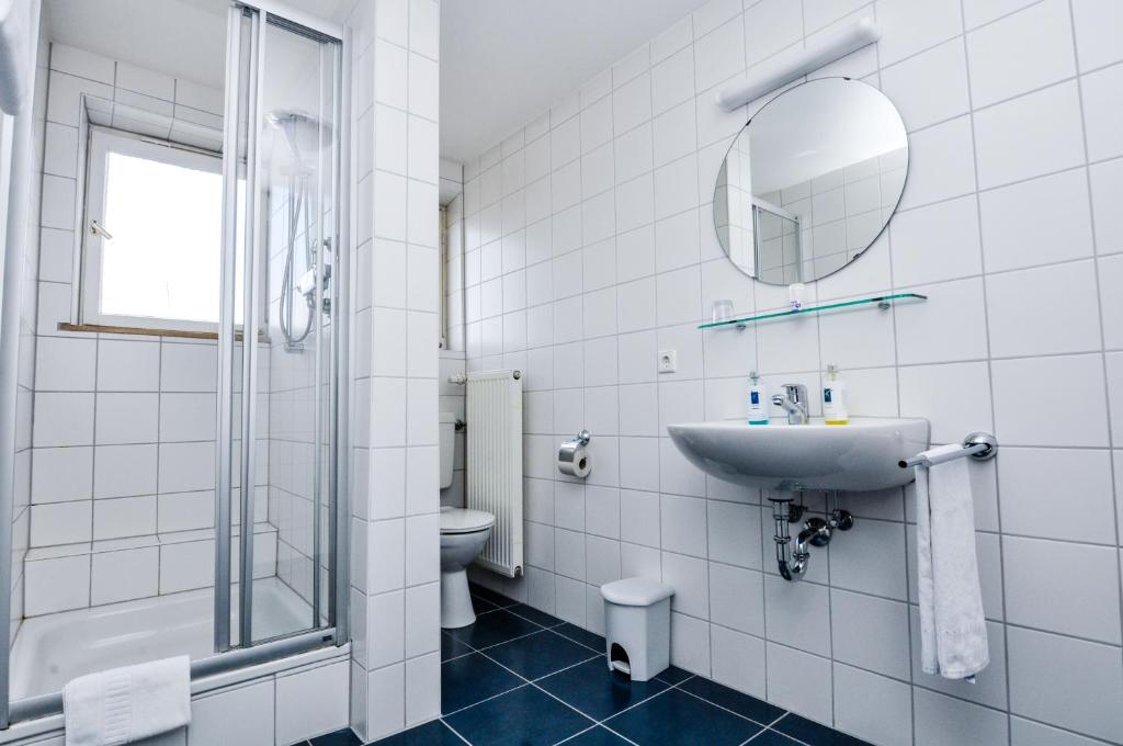 Koupelna v ubytování Hotel Garni Superior