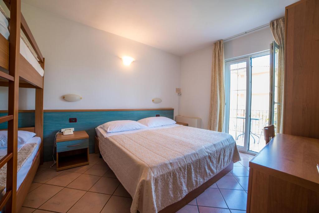 Postel nebo postele na pokoji v ubytování Belvedere Resort Hotels