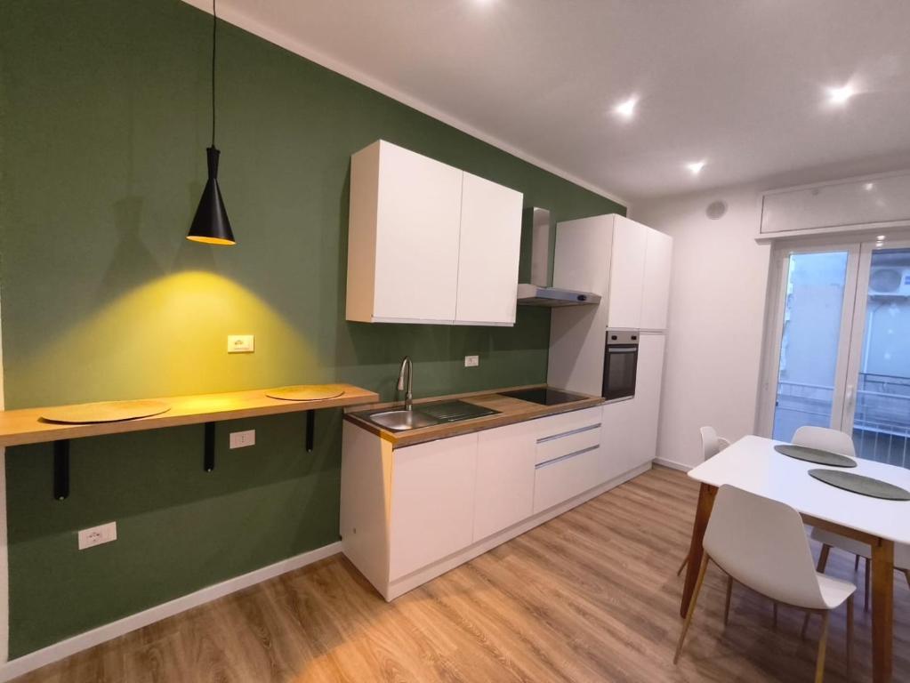 Kuchyň nebo kuchyňský kout v ubytování CasaMedì