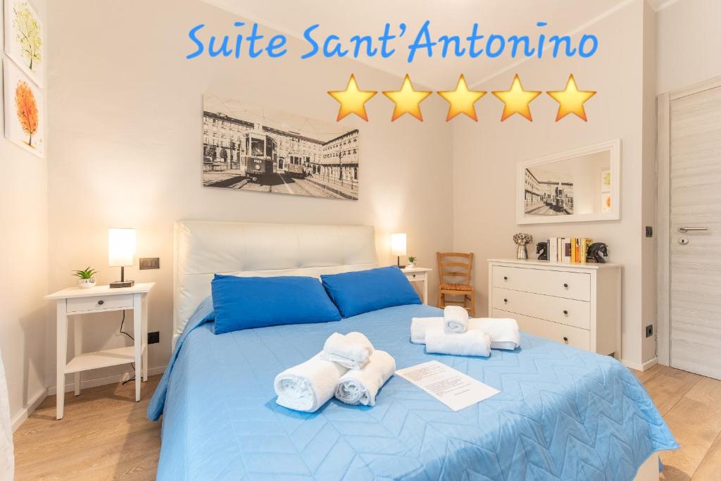 Ένα ή περισσότερα κρεβάτια σε δωμάτιο στο SUITE SANT ANTONINO 12 min di Metro e sei in Centro