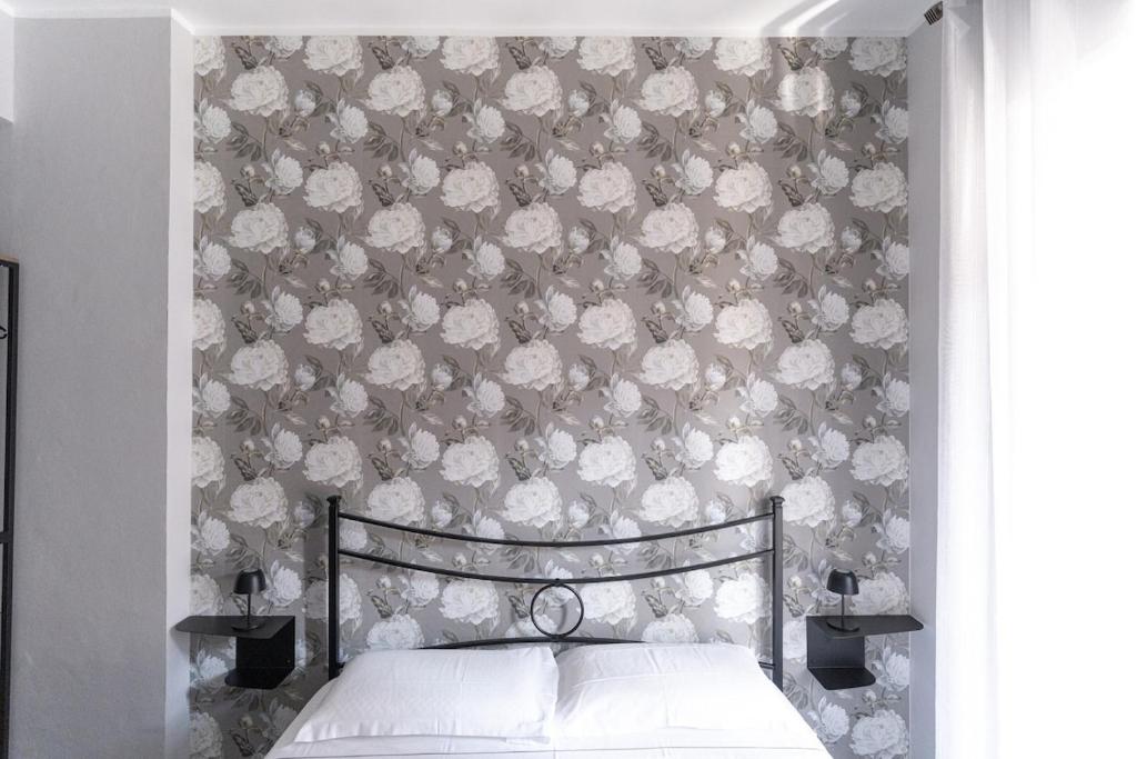 Postel nebo postele na pokoji v ubytování Balti50, lovely house in Turin