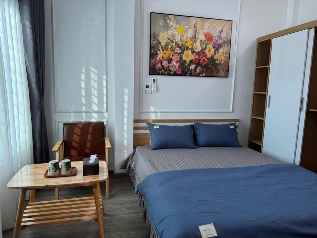 Ένα ή περισσότερα κρεβάτια σε δωμάτιο στο BaoDang-Homestay