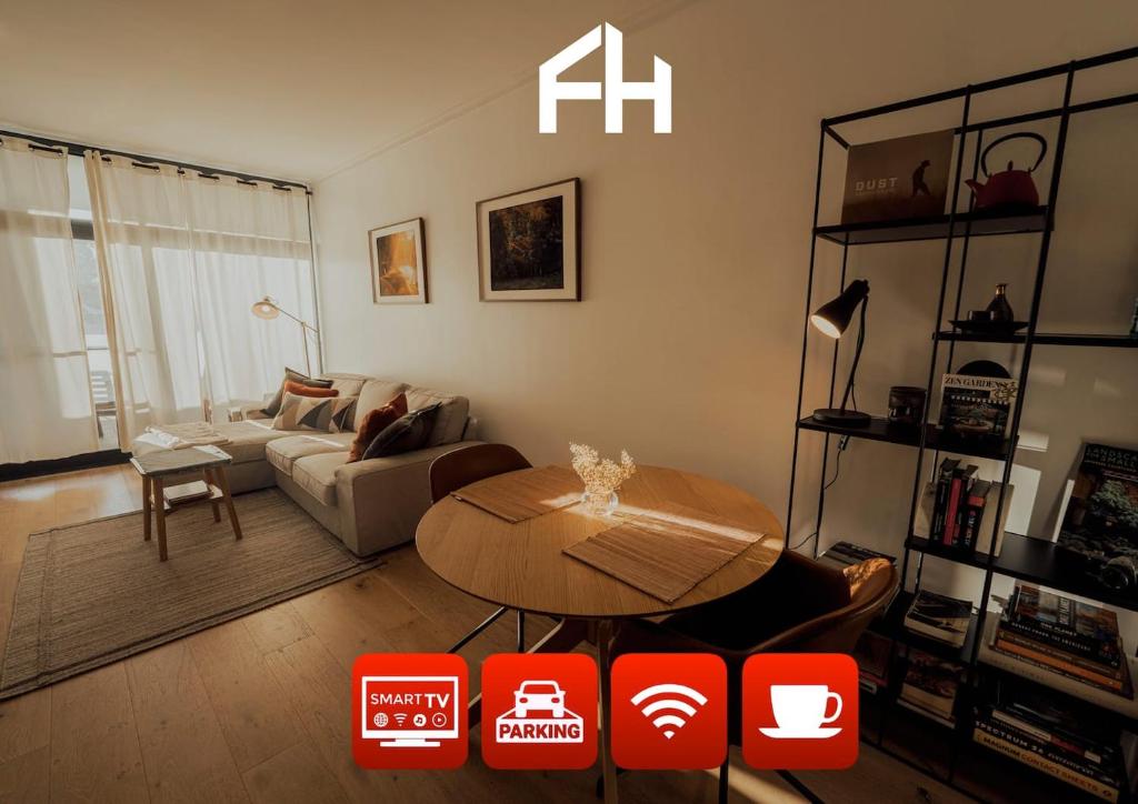 a living room with a table and a couch at Beaufort Street Gem Stylish 1br Getaway in Perth