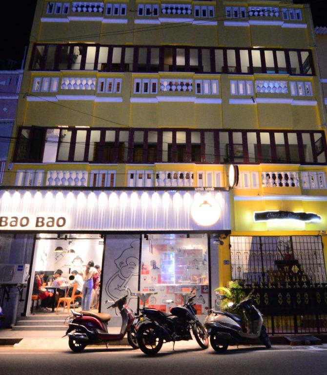 two motorcycles parked in front of a building at Chez Linda Home Stay at French colony in Pondicherry