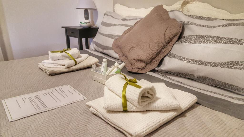 Postel nebo postele na pokoji v ubytování Relax nella Natura
