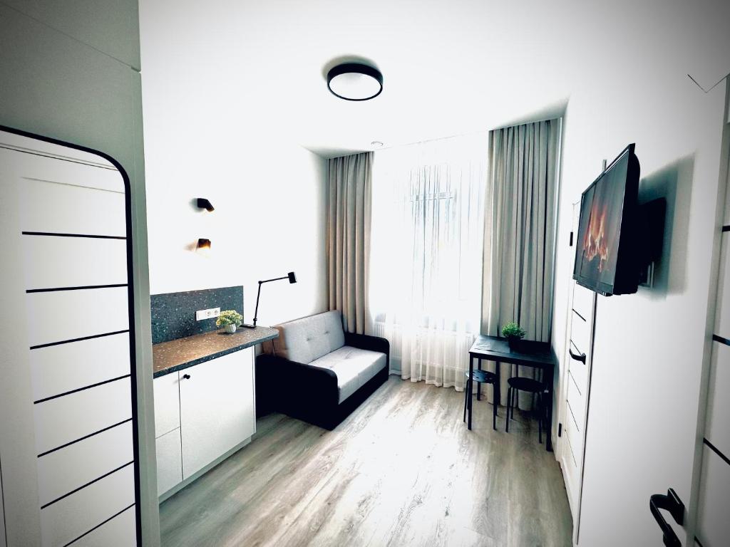 Televisyen dan/atau pusat hiburan di M&M Apartment III SELF CHECK-IN