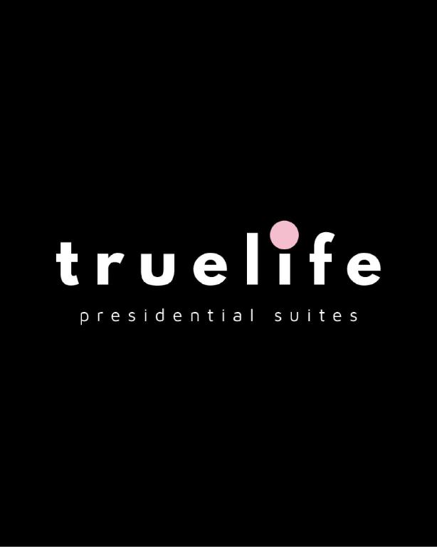 TrueLife Presidential Suites - 3BHK Luxurious AC Apartments - Modular Kitchen, RO water system, Microwave - Super fast WiFi, 55 Smart TV, 250 Airtel Channels - 3 bathrooms - Parking - Nearby PS4, A2B pure veg restaurants - Top service with lots of love photo