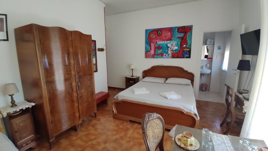 Postel nebo postele na pokoji v ubytování B&B Tou Lì