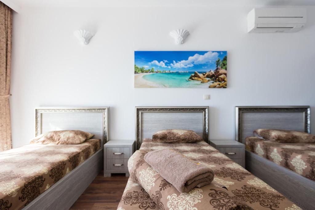 Postel nebo postele na pokoji v ubytování Boutique Apart Hotel Versis