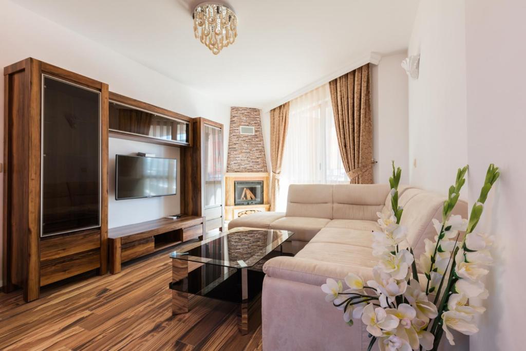 TV a/nebo společenská místnost v ubytování Boutique Apart Hotel Versis