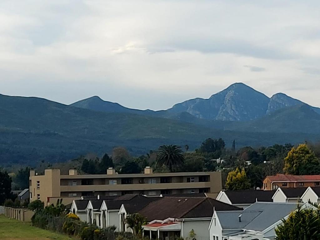 a view of a town with mountains in the background at 309 The Meadows in George