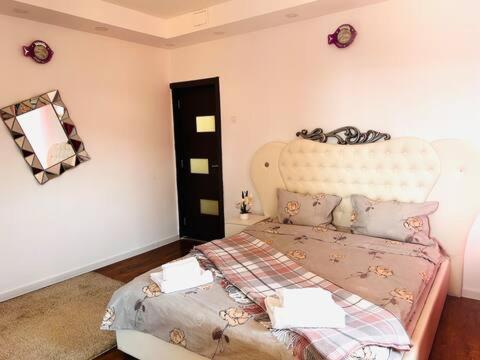 Postel nebo postele na pokoji v ubytování Simple and Cozy Room in Voluntari