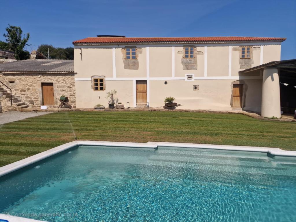 Πισίνα στο ή κοντά στο Finca As Roeles Caión
