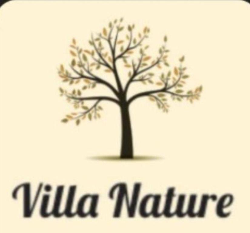 a logo for a tree with the words villa nature at Hotel Villa Nature Br 153 in Hidrolândia