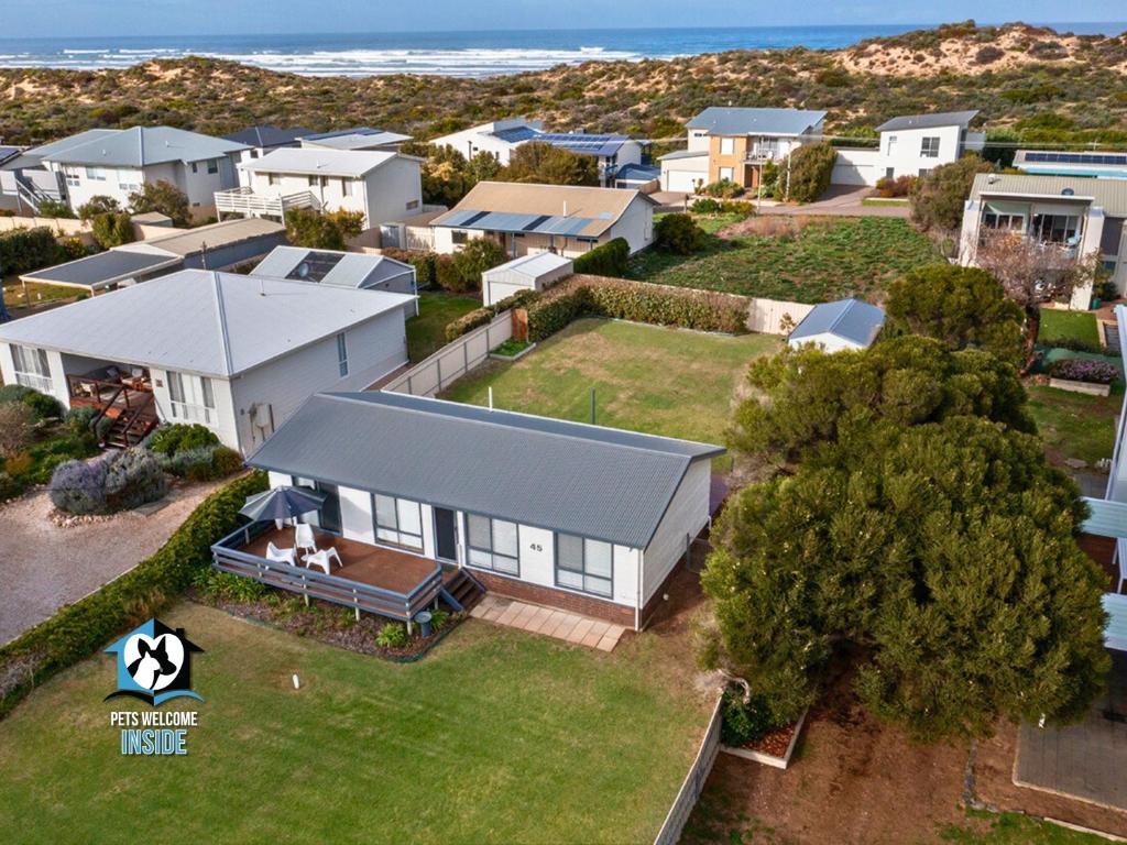 an aerial view of a house with a yard at Shaka Seaside Retreat with Beach Access in Goolwa South