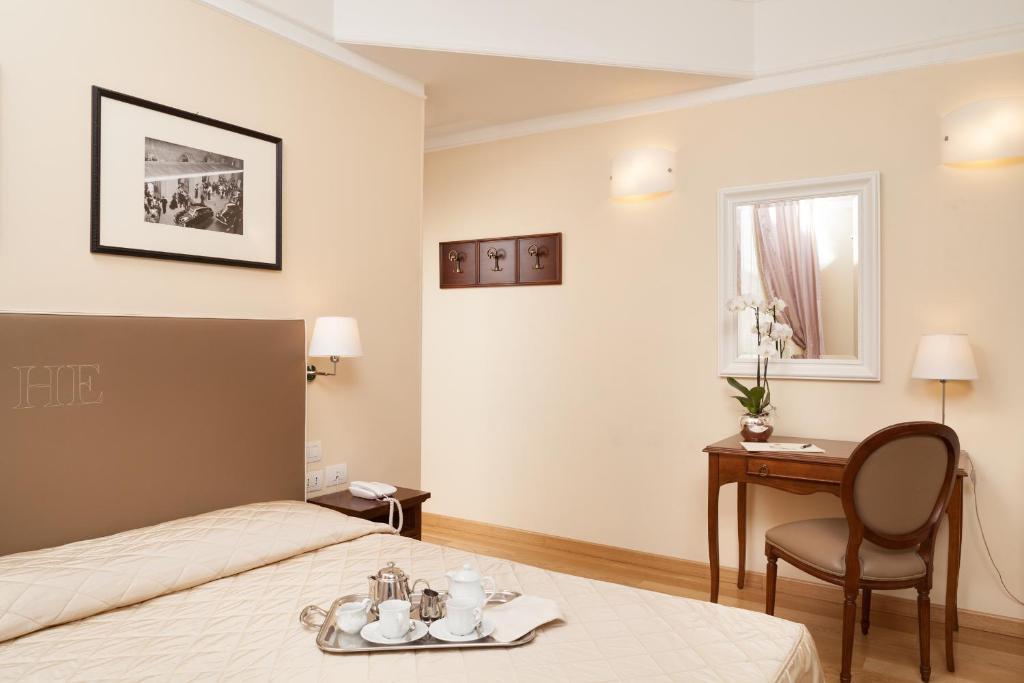 Postel nebo postele na pokoji v ubytování Hotel Executive