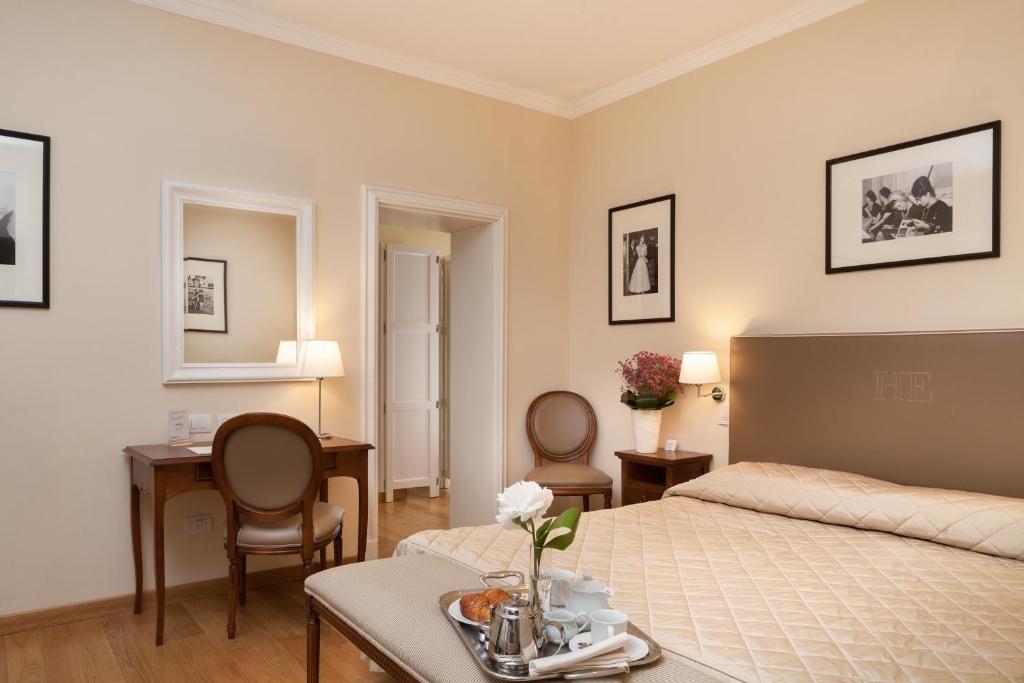 Postel nebo postele na pokoji v ubytování Hotel Executive