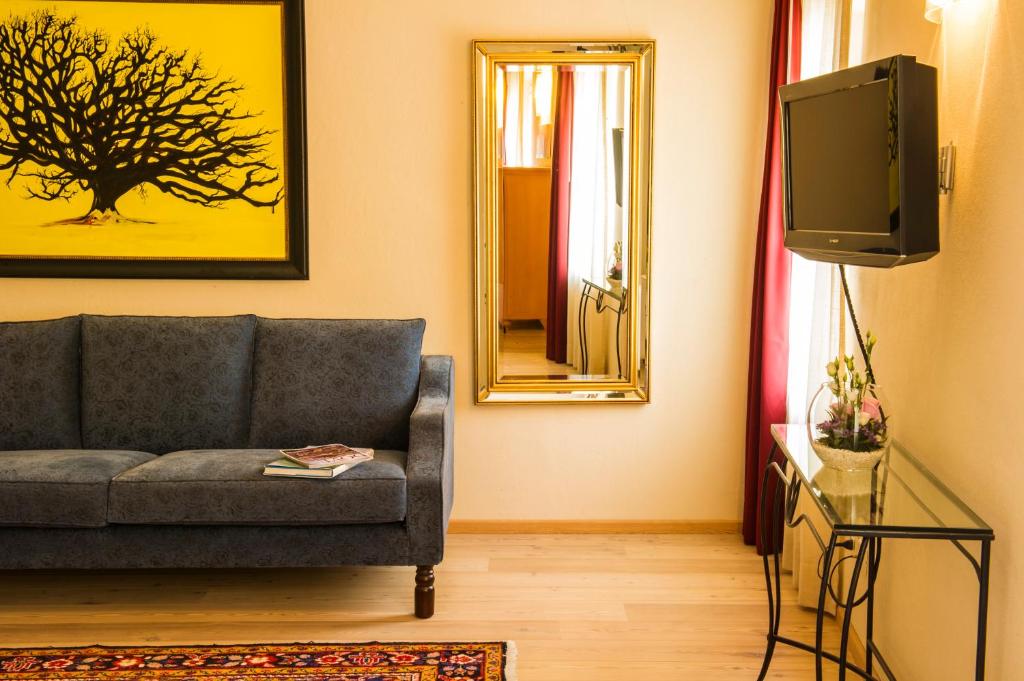 TV a/nebo společenská místnost v ubytování Villa de Winckels