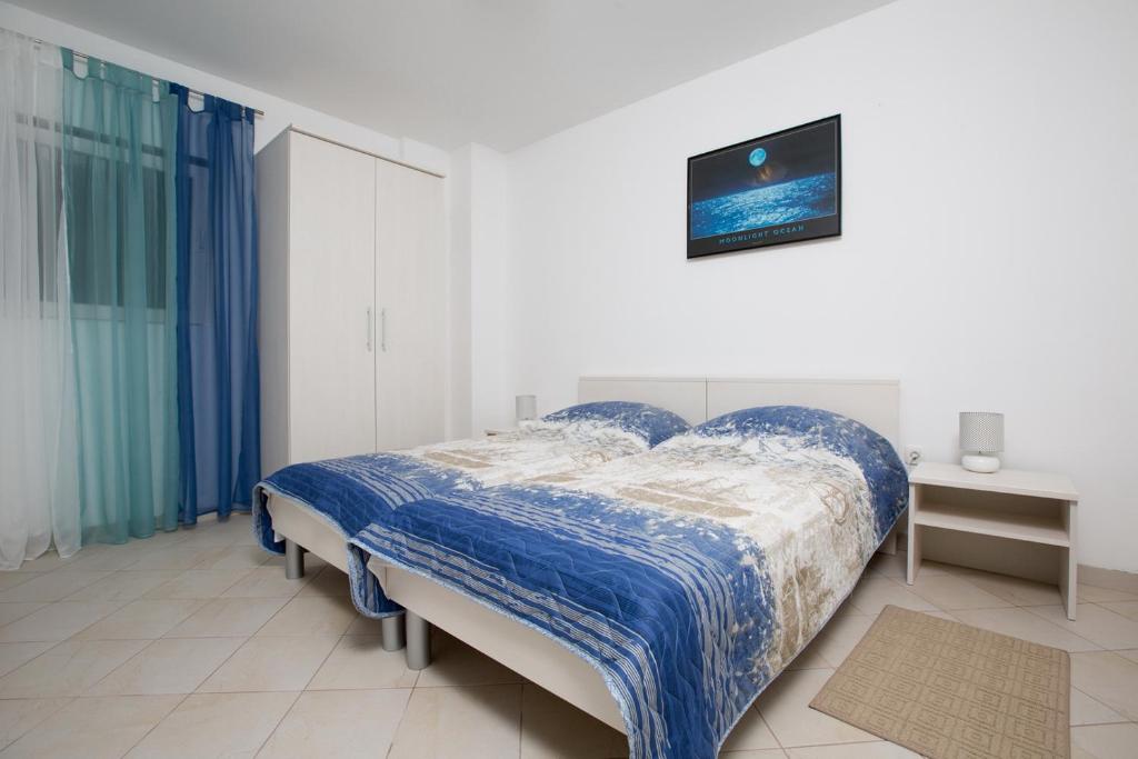 Posteľ alebo postele v izbe v ubytovaní Apartmani Ve-Ro