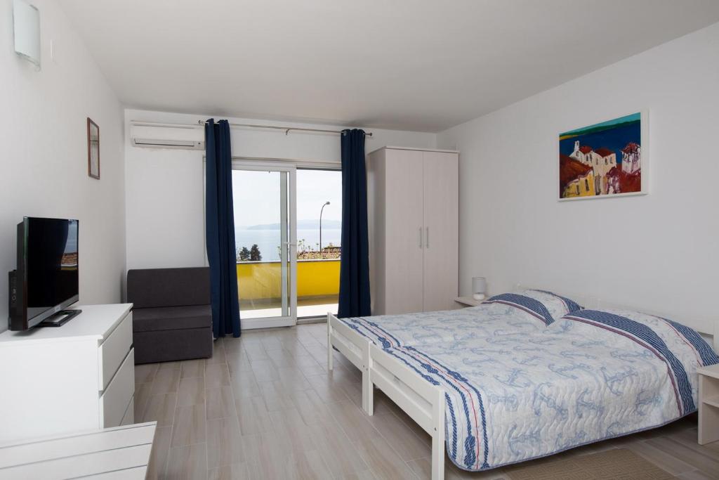Posteľ alebo postele v izbe v ubytovaní Apartmani Ve-Ro