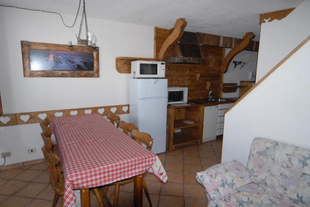 Kuchnia lub aneks kuchenny w obiekcie La Coquille Apartment