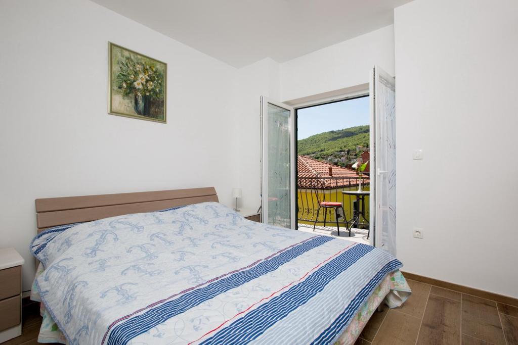Posteľ alebo postele v izbe v ubytovaní Apartmani Ve-Ro