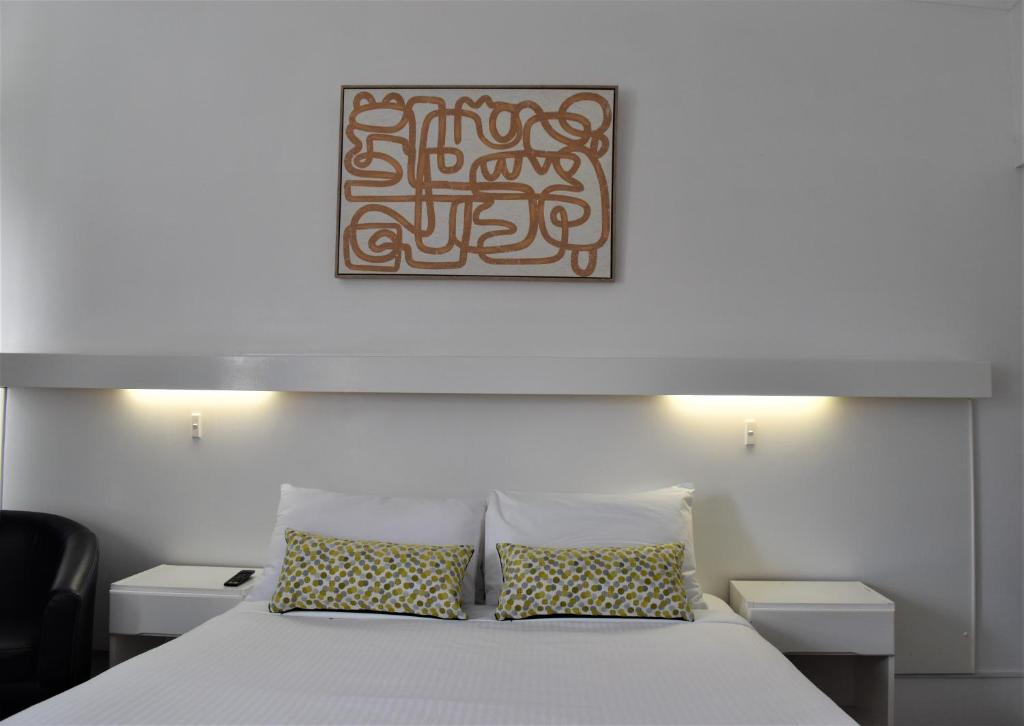 Postel nebo postele na pokoji v ubytování Ship Inn Motel Yarram