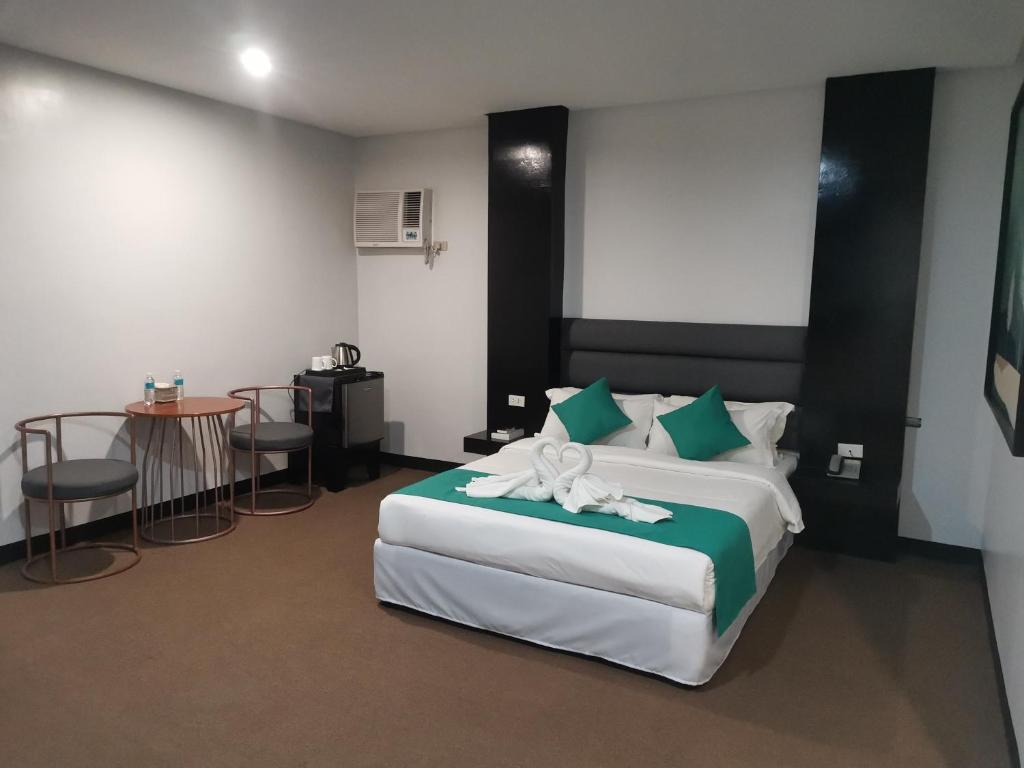 Кровать или кровати в номере Belvilla Cozy Stays Near Airport Formerly Boss Hotel