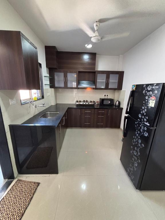 Kuchyň nebo kuchyňský kout v ubytování Spacious flat in city center