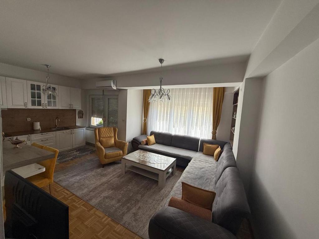 Svetainės erdvė apgyvendinimo įstaigoje Olas Appartment