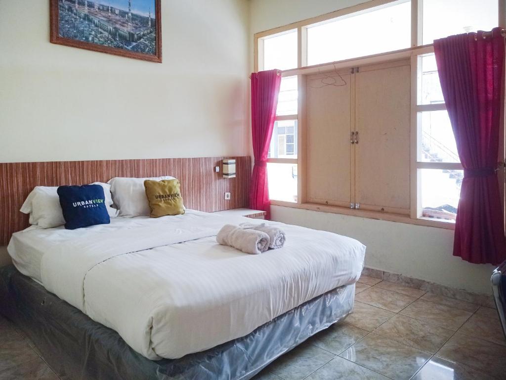 Urbanview Hotel Sindu Syariah Bengkulu - Habitación Doble Deluxe