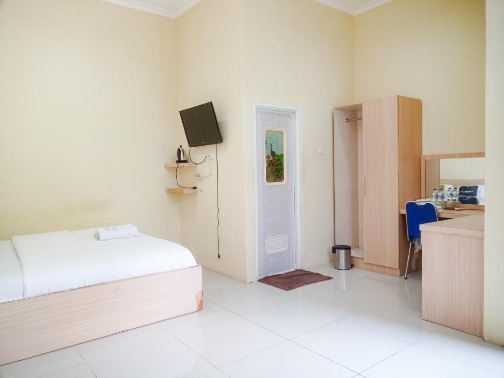 Urbanview Hotel Sindu Syariah Bengkulu - Suite Ejecutiva