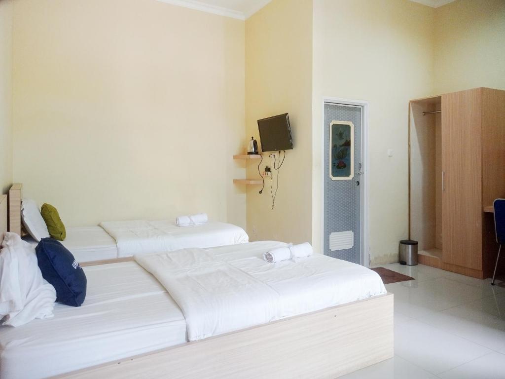 Urbanview Hotel Sindu Syariah Bengkulu - Habitación Doble Grande