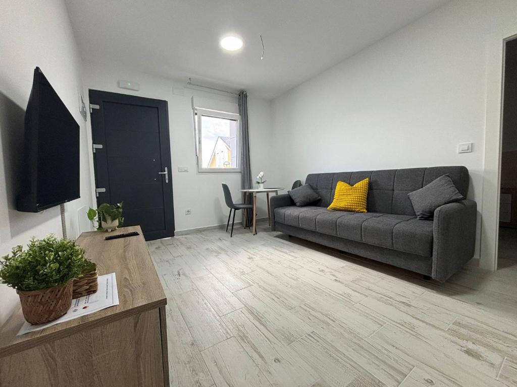 Χώρος καθιστικού στο Apartahotel Bella Aurora