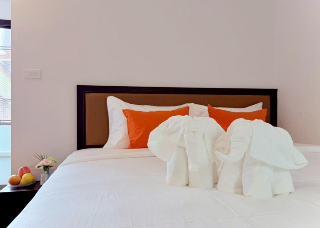 Ένα ή περισσότερα κρεβάτια σε δωμάτιο στο Tha Phae Village