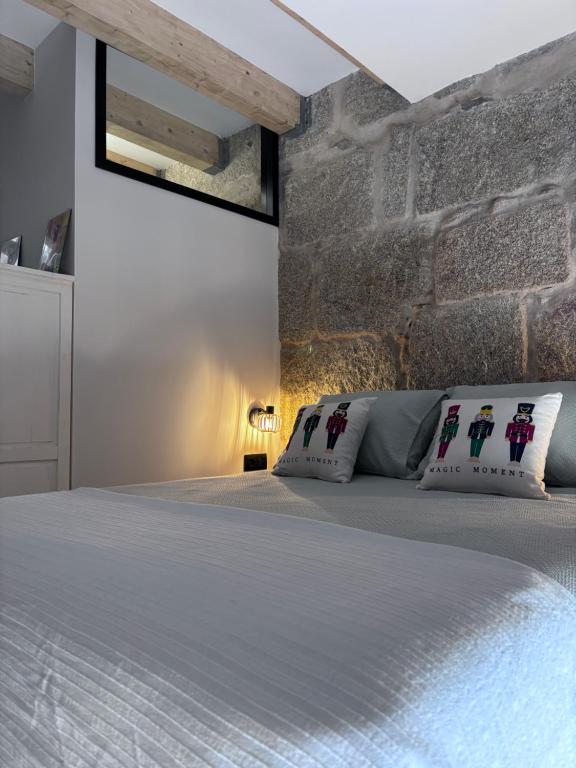 En eller flere senge i et værelse på Casa Chavida