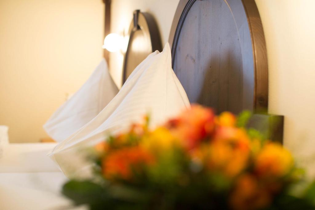 Postel nebo postele na pokoji v ubytování Altstadt Hotel Stadtkrug