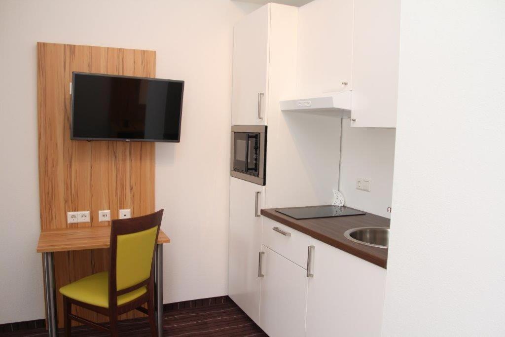 Kuchyň nebo kuchyňský kout v ubytování Schäfer Boardinghouse