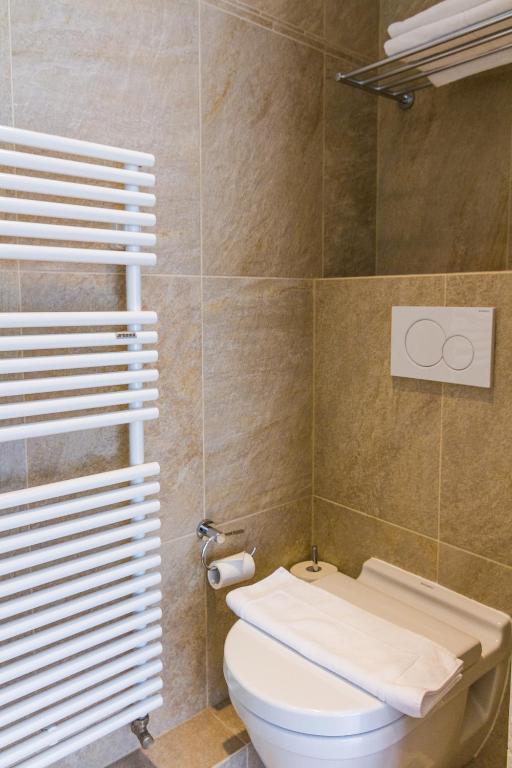 Koupelna v ubytování Hôtel Elite