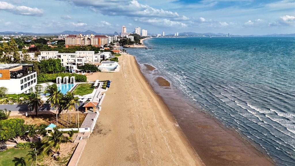 an aerial view of a beach and the ocean at Veranda Residence By Hello Pattaya in Jomtien Beach