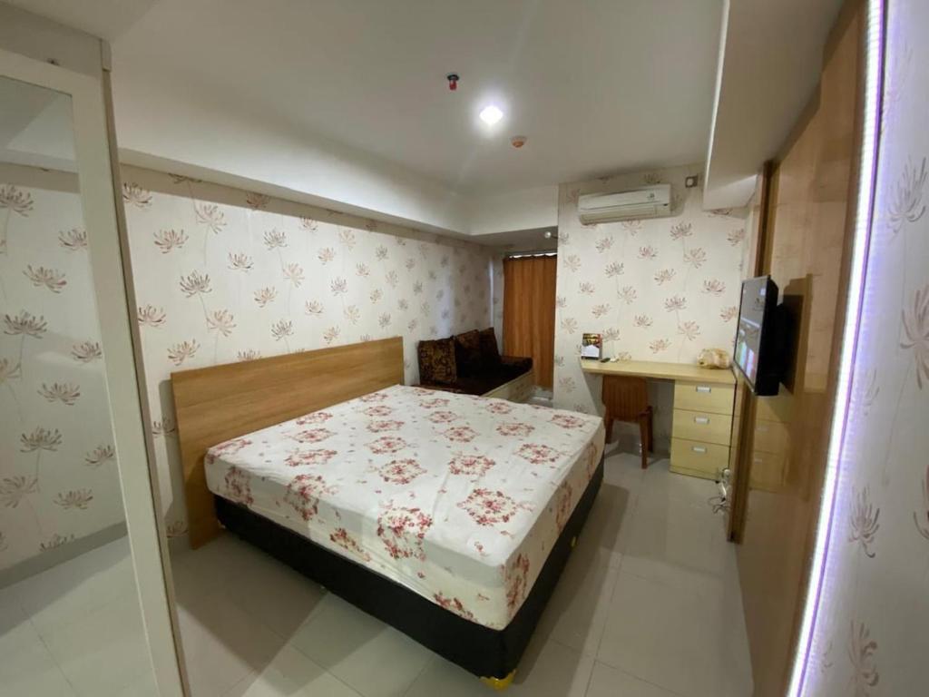 Ένα ή περισσότερα κρεβάτια σε δωμάτιο στο Comfy Studio Room Apartment