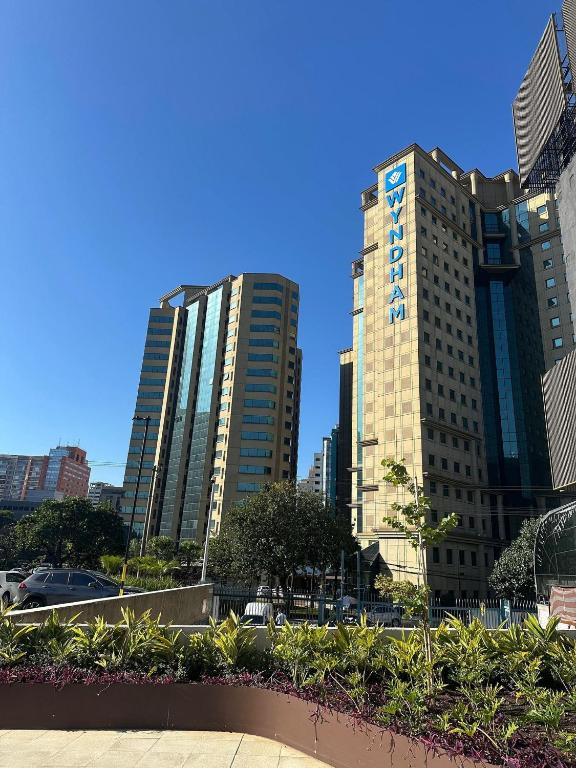 a group of tall buildings in a city at Flat 1638 on Ibirapuera Avenue in Moema - São Paulo in São Paulo