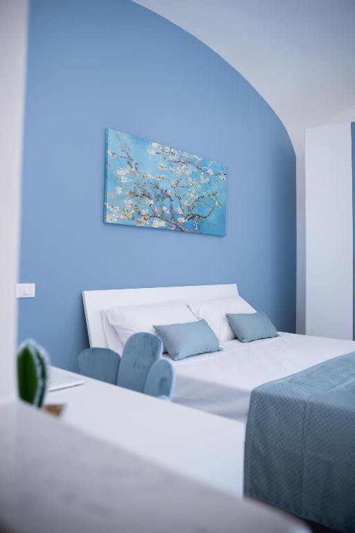 Postel nebo postele na pokoji v ubytování Home Parthenope