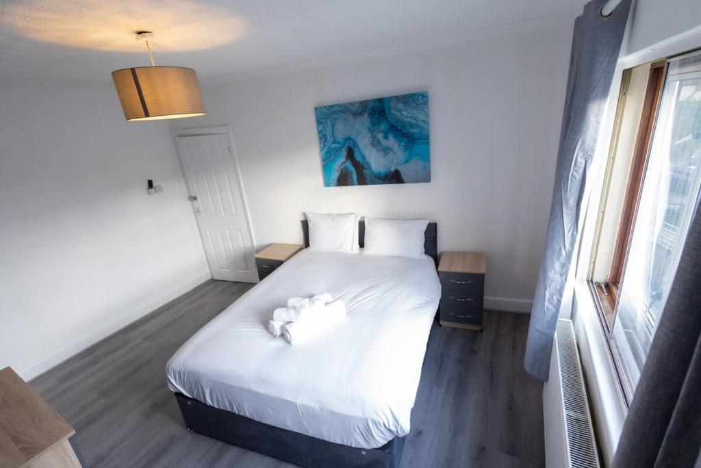 Voodi või voodid majutusasutuse Large 4-Bedrooms Corporate Flat, Free Parking - Amazing Location toas