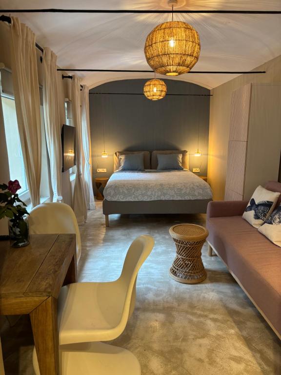 Ένα ή περισσότερα κρεβάτια σε δωμάτιο στο Vida's homes